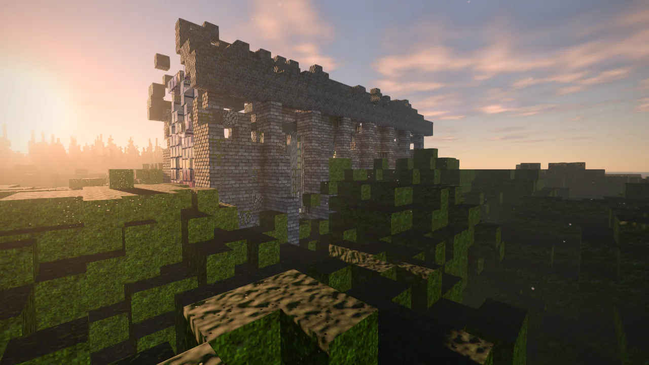 A ruined chapel on a hill at dusk