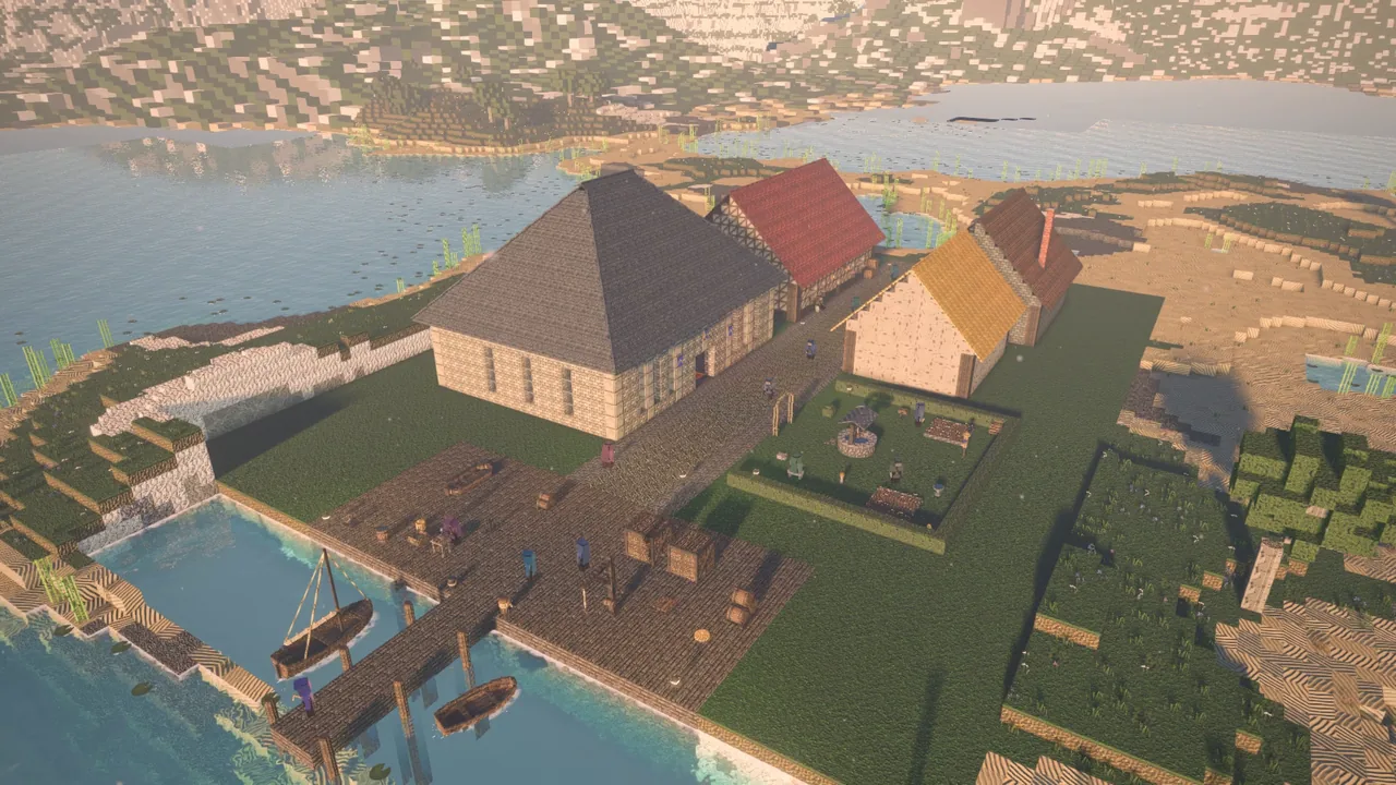 A coastal town from above: slate and red tiled roofs, a harbour with boats, gardens