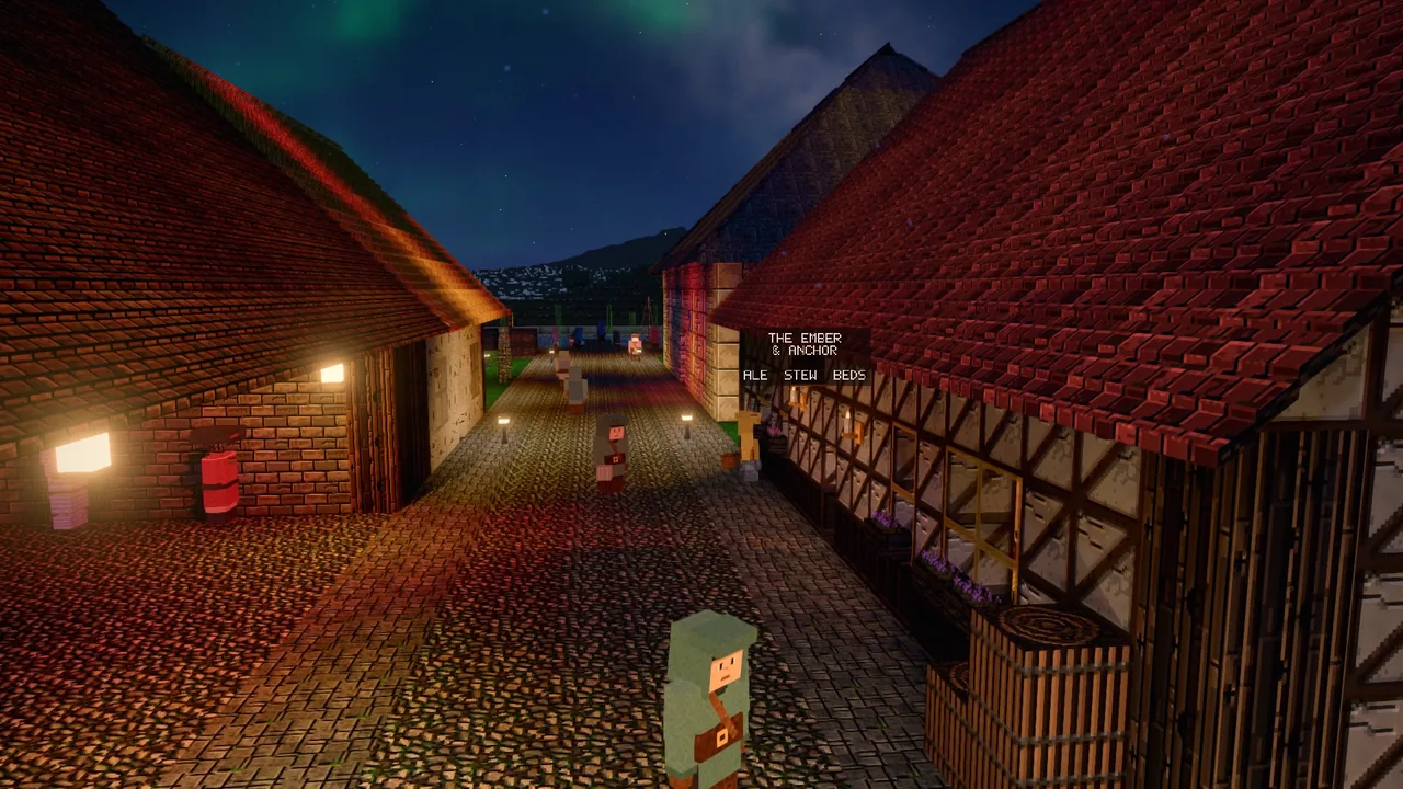 A town street at night, lanterns lit outside the timber houses